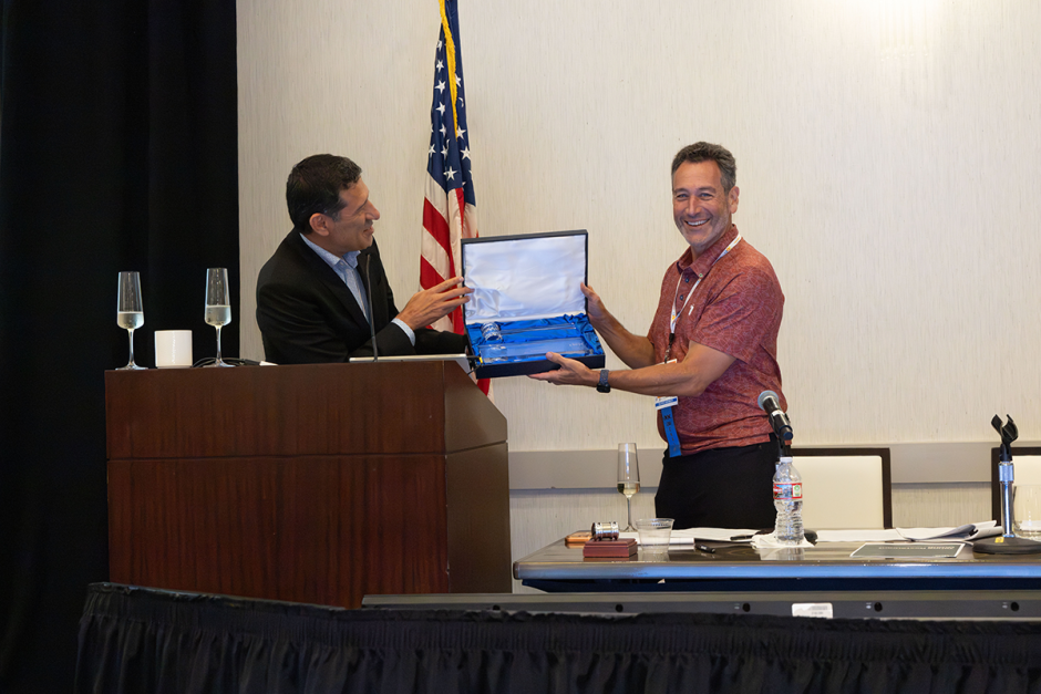 CRA State Board Chair Fred Glick [right] handing off the gavel to incoming CRA State Board Chair Ray Villaman [left] at the August 2026 CRA Board Meeting.