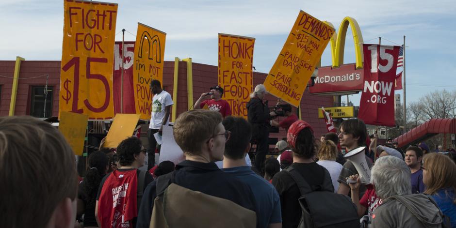 People holding signs