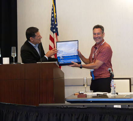 CRA State Board Chair Fred Glick [right] handing off the gavel to incoming CRA State Board Chair Ray Villaman [left] at the August 2026 CRA Board Meeting.