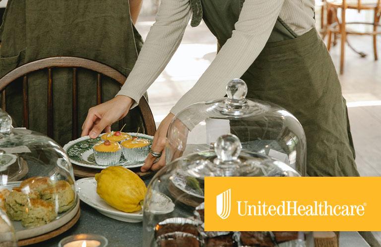 People people setting a table with treats