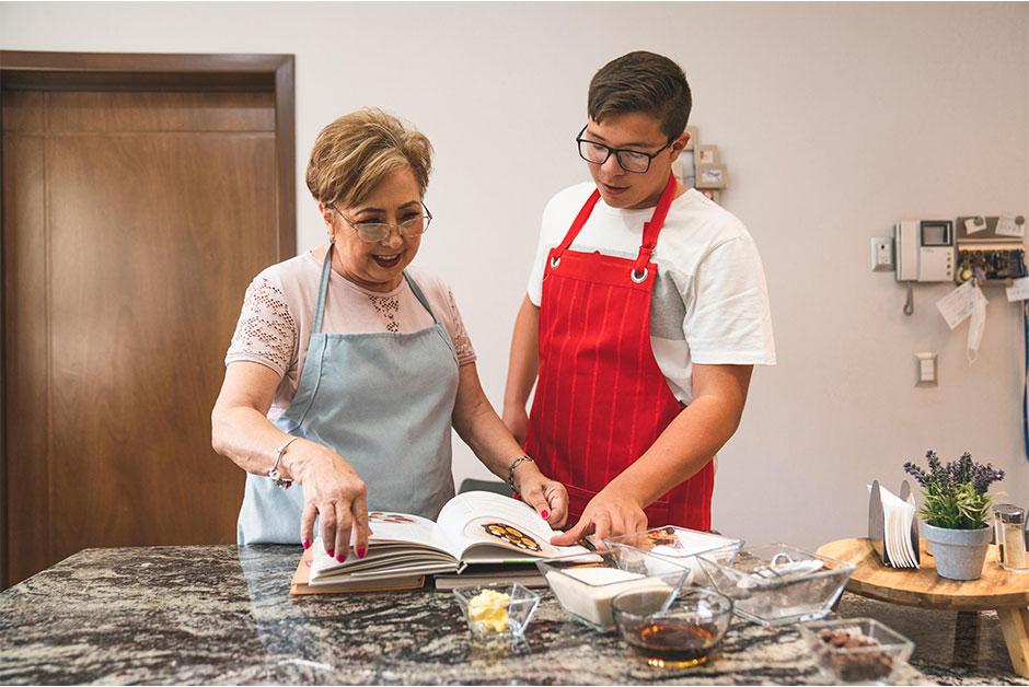 Grandma and Grandson Reading a Cookbook - Pexels - LMC