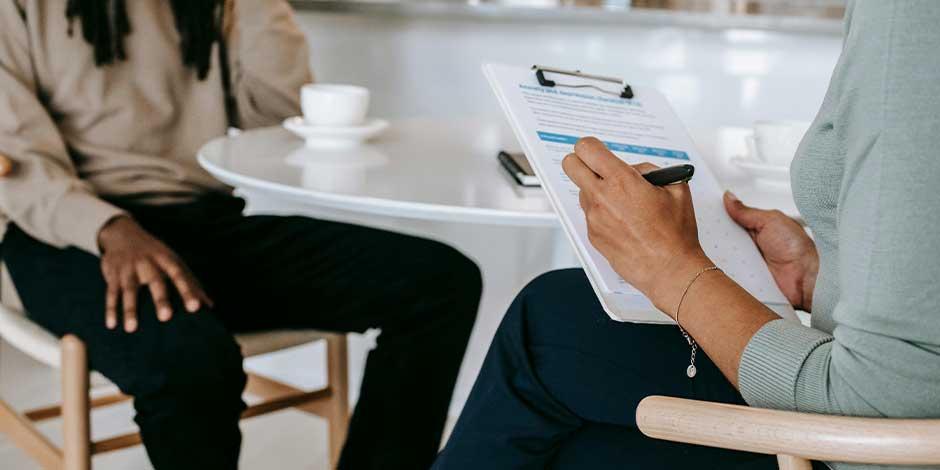 People sitting at table for an interview