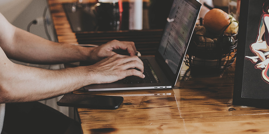Man in front of computer